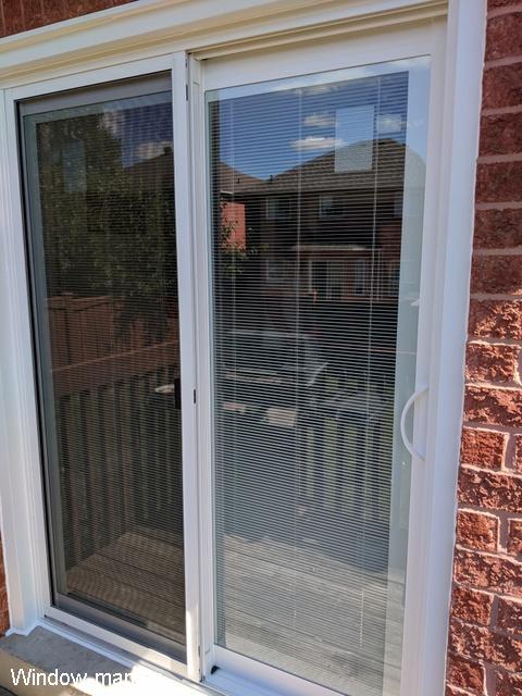 5 Five foot Sliding patio doors with blinds. Low e coating, Argon gas. White. Tilt and lift internal Mini Blinds. Installed by an independent contractor